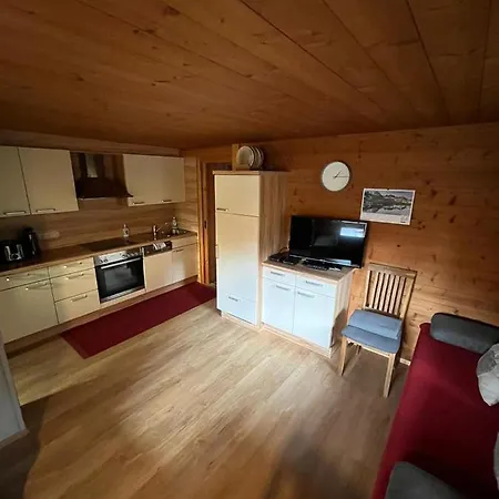 Çiftlik konaklama Woerglerhof's Huettenapartments Mit Kachelofen