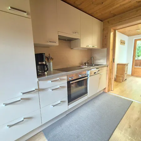 Farmház Woerglerhof's Huettenapartments Mit Kachelofen